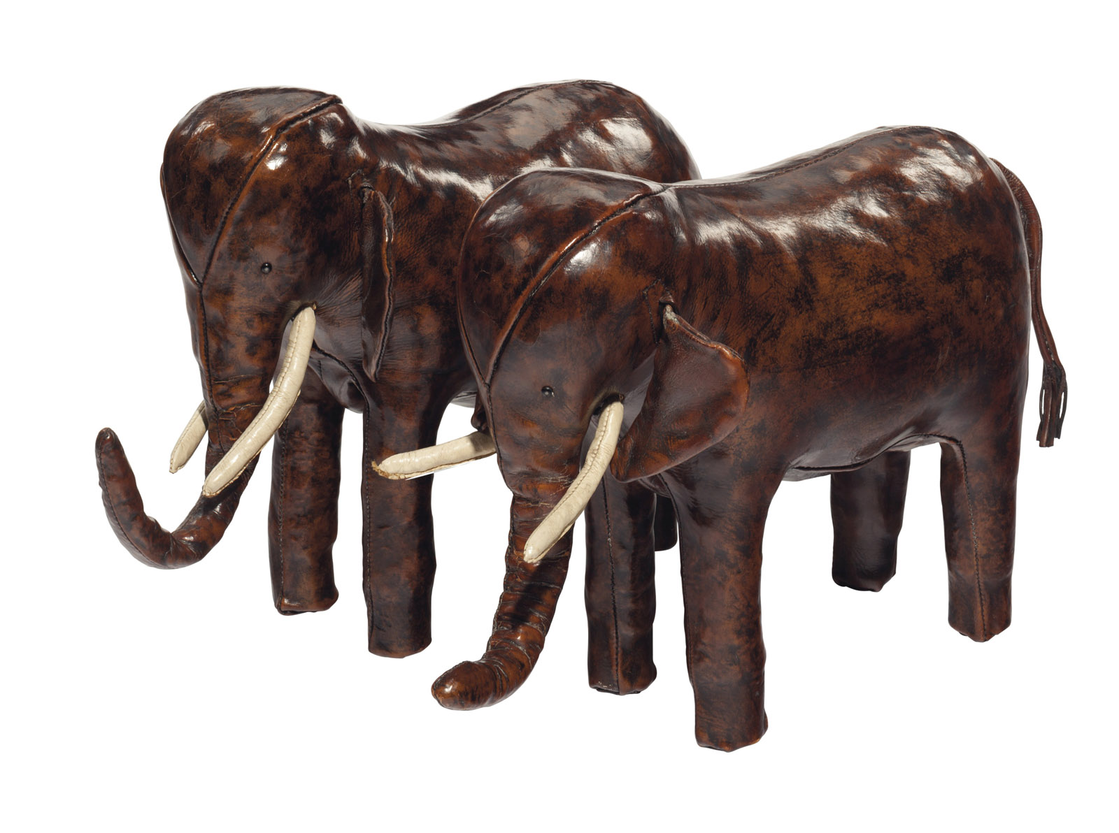 This undated photo provided by Christie's shows a pair of English cowhide leather elephant-shaped ottomans. The ottomans, which will be sold by Christie's New York during a two-day auction of the contents of Ronald and Nancy Reagan's ranch-style home in California, have a pre-sale estimate of $2,000-$3,000. Christieâ€™s announced Thursday, June 30, 2016, highlights of the Sept. 21-22 sale in New York City. (Christie's via AP) MANDATORY CREDIT