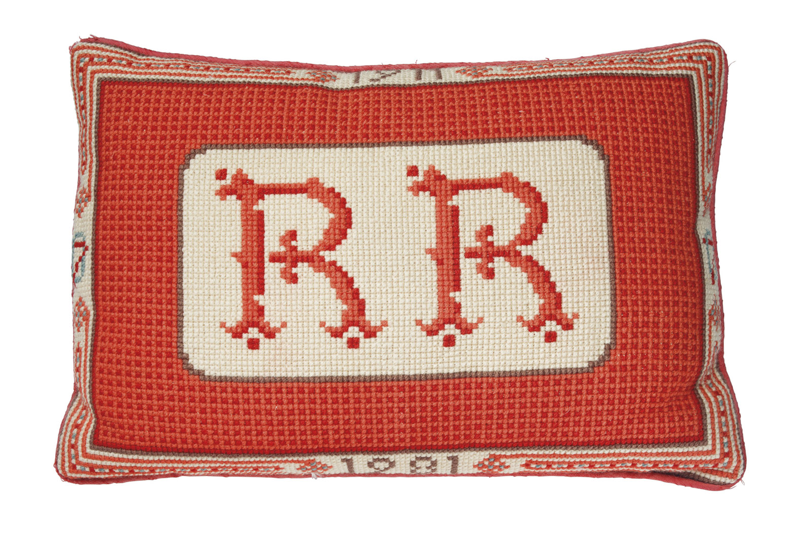 This undated photo provided by Christie's shows a needlepoint cushion given to Ronald Reagan for his 70th birthday in 1981. The pillow, which will be sold by Christie's New York during a two-day auction of the contents of Ronald and Nancy Reagan's ranch-style home in California, has a pre-sale estimate of $1,000-1,500. Christieâ€™s announced Thursday, June 30, 2016, highlights of the Sept. 21-22 sale in New York City. (Christie's via AP) MANDATORY CREDIT
