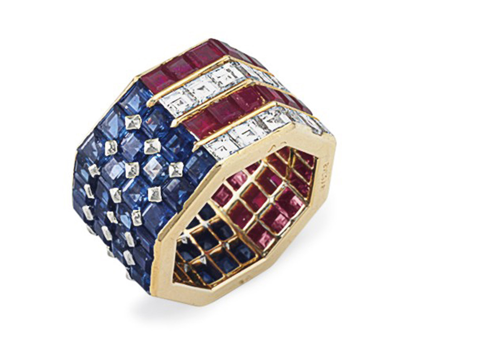 This undated photo provided by Christie's shows a Bulgari diamond, sapphire and ruby ring set in an American flag motif that was once worn by Nancy Reagan. The ring, which will be sold by Christie's New York during a two-day auction of the contents of Ronald and Nancy Reagan's ranch-style home in California, has a pre-sale estimate of $5,000-$8,000. Christieâ€™s announced Thursday, June 30, 2016, highlights of the Sept. 21-22 sale in New York City. (Christie's via AP) MANDATORY CREDIT