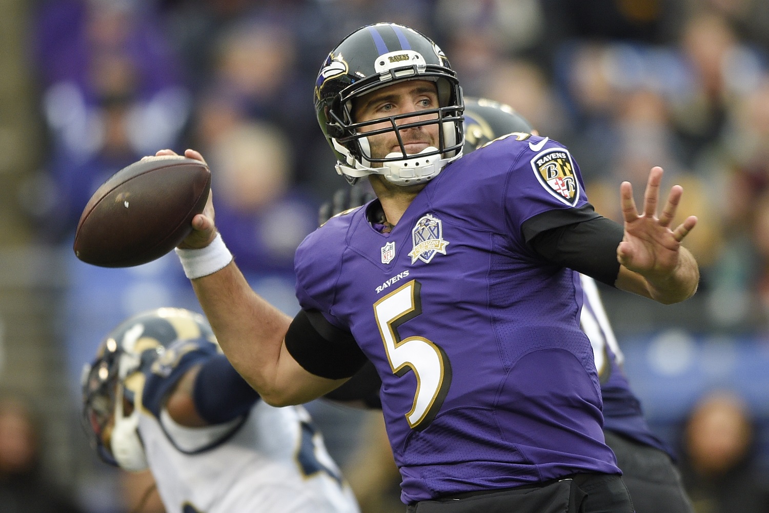 FILE - In this Nov. 22, 2015, file photo, Baltimore Ravens quarterback Joe Flacco passes the ball during the second half of an NFL football game against the St. Louis Rams, in Baltimore. Flacco, Justin Forsett and Terrell Suggs are among several members of the Ravens eager to return to the field after spending the latter stages of the 2015 season sidelined by injuries. (AP Photo/Nick Wass, File)