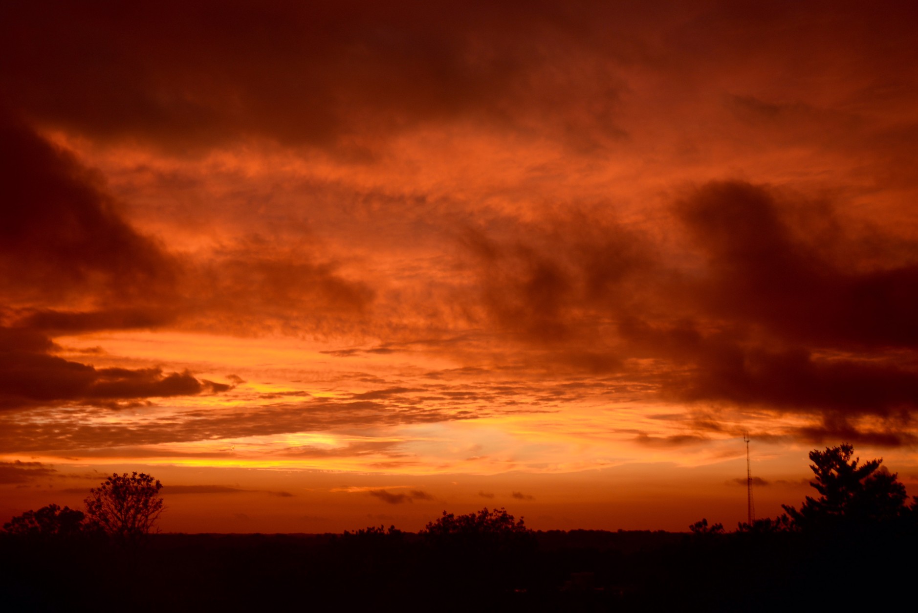 The final week of summer featured high temperatures about 5 to 10 degrees above average. Clouds from former tropical storm Julia moved over Washington on Monday and lead to a dramatic sunset on Monday, September 19 -- the final sunset of summer. (WTOP/Dave Dildine)