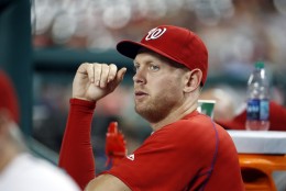 Washington Nationals starting pitcher Stephen Strasburg pauses in the dugout during a baseball game against the Philadelphia Phillies at Nationals Park, Thursday, Sept. 8, 2016, in Washington. Strasburg left Wednesday's game with an injury. The Phillies won 4-1. (AP Photo/Alex Brandon)