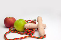 Fitness concept  with   Jumping rope  and fresh fruits