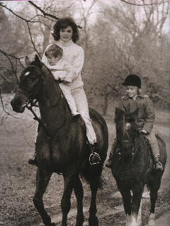 In this undated photo, Jackie Kennedy with her son John on Sadar and daughter Caroline on her pony Macaroni go for a ride in Middleburg where the first family spent many weekends. The current owners of the Kennedy's Northern Virginia home have put the house and surroudning property up for sale. (Courtesy of © Howard Allen Studios)