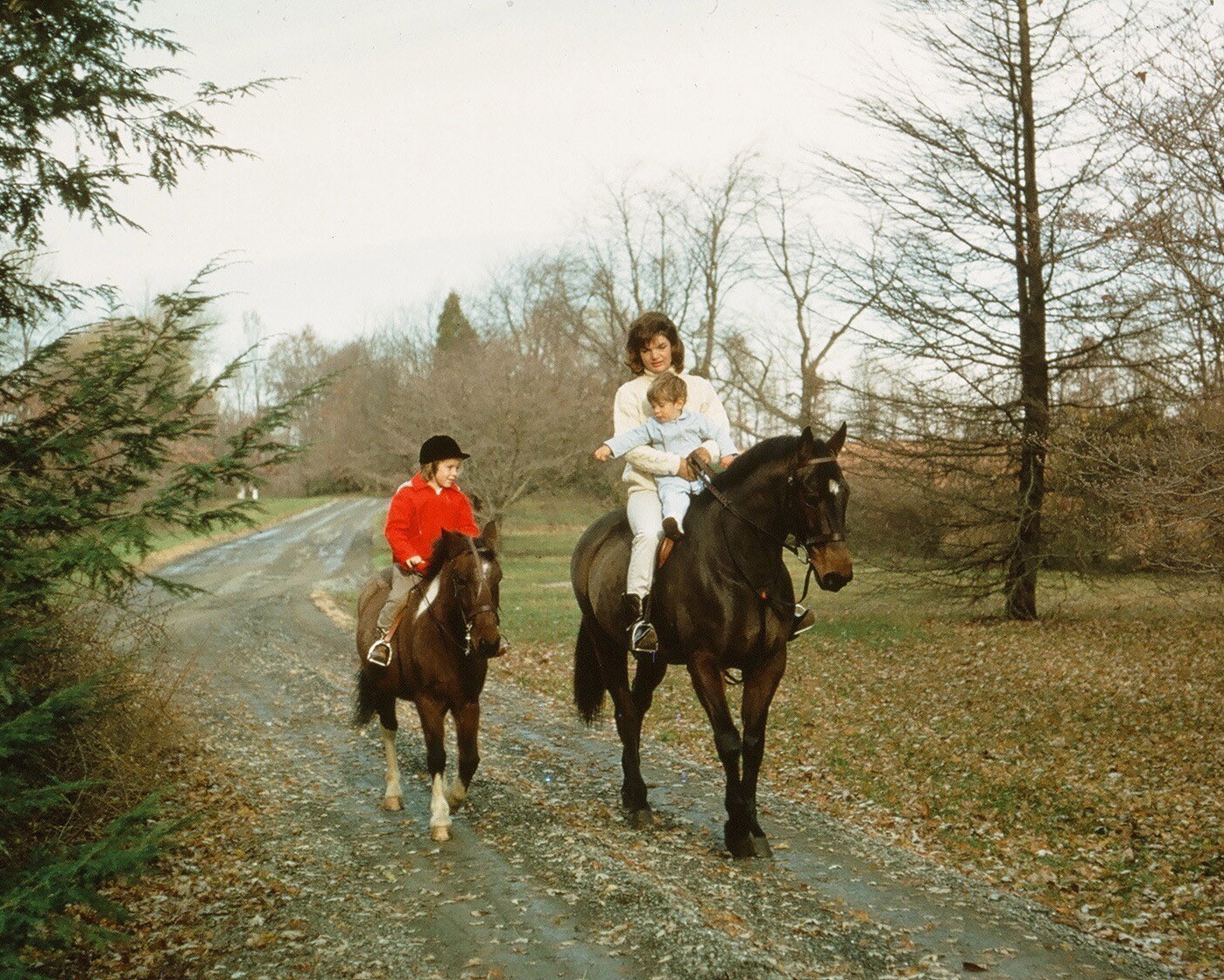 Jackie Kennedy with her son John on Sadar and daughter Caroline on her pony Macaroni go for a ride in Middleburg where the first family spent many weekends.The Kennedy's home near Middleburg, called Wexford Estate, is on the market. The asking price for the four-bedroom, single-story house is $5.9 million.  (Courtesy of ©  Howard Allen Studios)