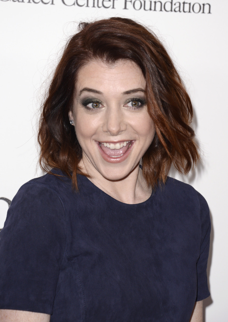 Alyson Hannigan arrives at the 19th annual "Taste For A Cure" at the Beverly Wilshire Hotel on Friday, April 25, 2014, in Beverly Hills, Calif. (Photo by Dan Steinberg/Invision/AP)