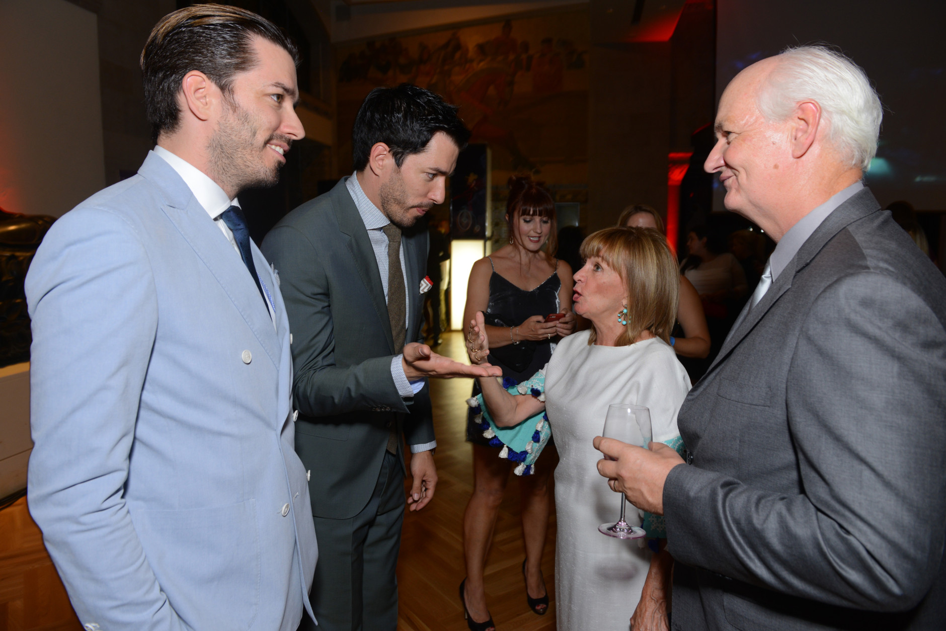 Jonathan Scott and, from left, Drew Scott,  Debra McGrath and Colin Mochrie attend the Producers Ball at the Royal Ontario Museum on Wednesday, Sept. 3, 2014, in Toronto. (Photo by Arthur Mola/Invision for Producers Ball/AP Images)