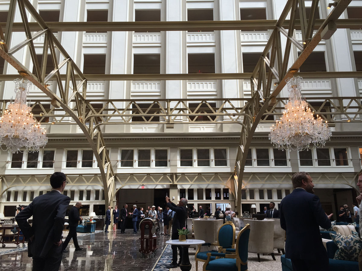 The grand lobby of the Trump International Hotel on Pennsylvania Avenue in D.C. The hotel held a "soft opening" on Sept. 12. The Trump Organization won a 60-year lease from the federal government to transform the Old Post Office building into a hotel. (WTOP photo/Rich Johnson)