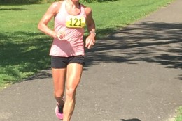 Brooke Sydnor Curran is the founder of RunningBrooke, a nonprofit that renovates playgrounds in Alexandria, Va., neighborhoods where most of the children are younger than 5. This photo was taken on Aug. 7, 2016, after her 98th marathon. Her first marathon was the Marine Corps Marathon in 2004. This year’s Marine Corps Marathon, scheduled for Oct. 30, 2016, will be her 100th. (Courtesy Brooke Sydnor Curran)