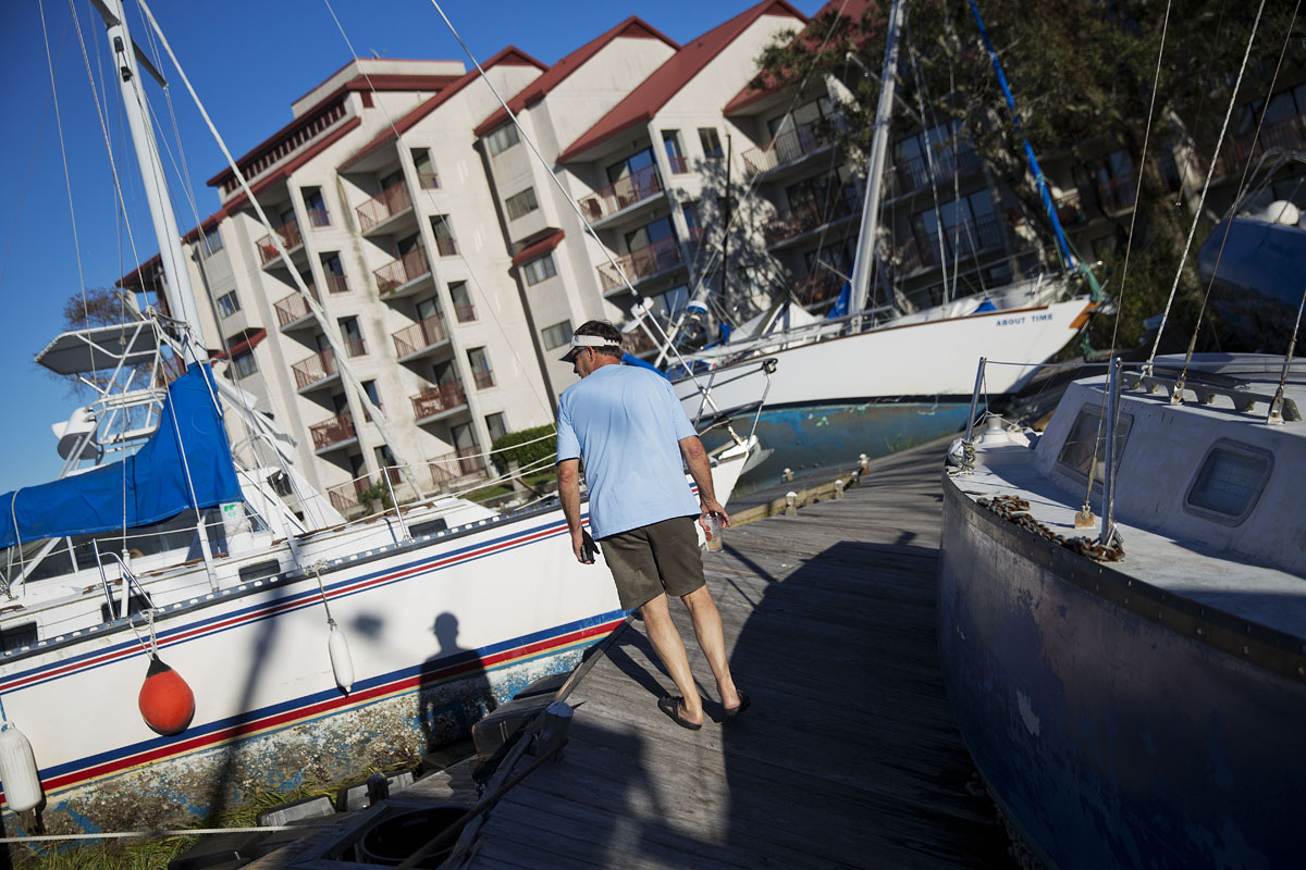 Boats sit washed up on shore amongst the twisted docks at Palmetto Bay Marina damaged by Hurricane Matthew in Hilton Head, S.C., Sunday, Oct. 9, 2016. (AP Photo/David Goldman)