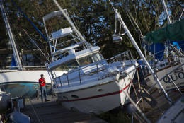 Boats sit pushed up amongst the twisted docks at Palmetto Bay Marina damaged by Hurricane Matthew in Hilton Head, S.C., Sunday, Oct. 9, 2016. (AP Photo/David Goldman)