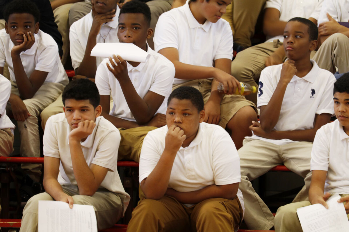 Students listen (and one checks out the camera) at Stephen Decatur Middle School. (WTOP/Kate Ryan)