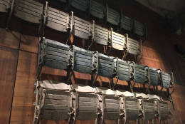 Some of the original arena seats also adorn the walls. (WTOP/Michelle Basch)