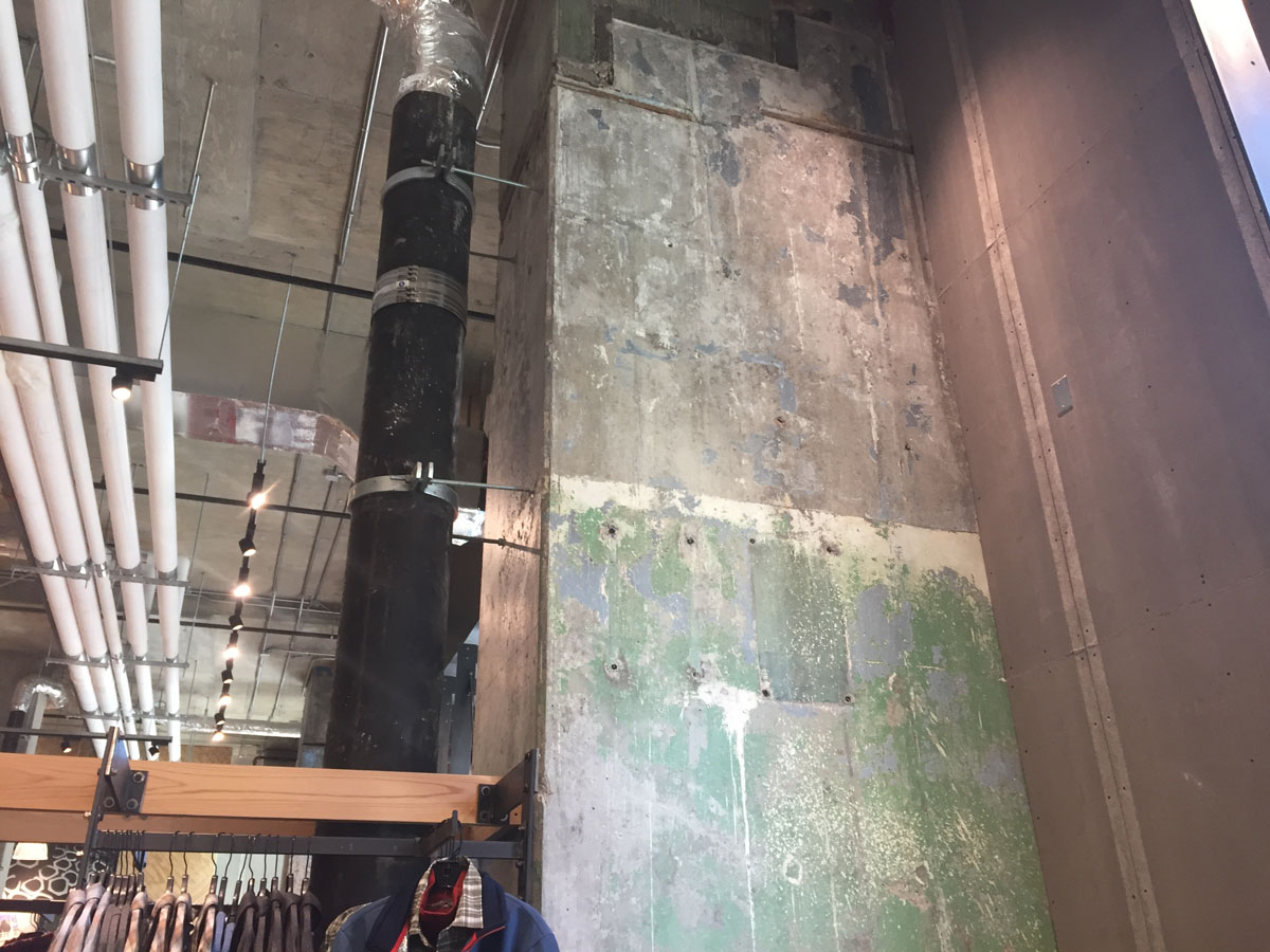 You can spot hints of the building's past throughout the store. This is an original column deliberately left unfinished. (WTOP/Michelle Basch)