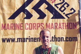 Jim Anderson has completed all of the Marine Corps Marathons from 2004 to 2015, except in 2011. This photo was taken after he finished the 2014 race. “I’m just Jim Anderson but I think I represent the story of a lot of people who are doing it for a lot of personal reasons,”  he says. (Courtesy Jim Anderson)