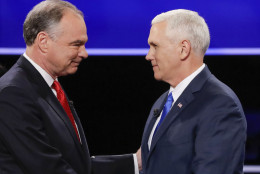 Republican vice-presidential nominee Gov. Mike Pence, right, and Democratic vice-presidential nominee Sen. Tim Kaine shake hands during the vice-presidential debate at Longwood University in Farmville, Va., Tuesday, Oct. 4, 2016. (AP Photo/David Goldman)