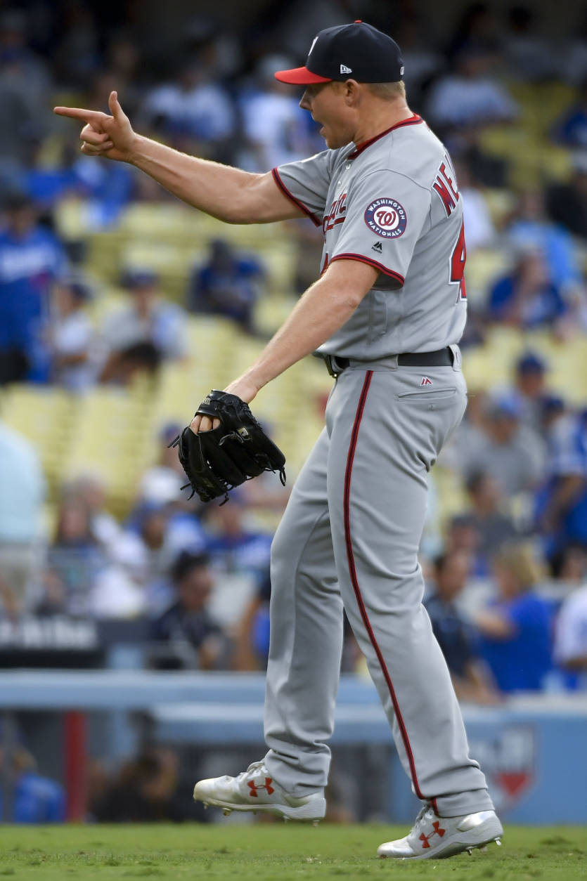 Washington Nationals relief pitcher Mark Melancon celebrates after their 8-3 win against the Los Angeles Dodgers during Game 3 of baseball's National League Division Series in Los Angeles, Monday, Oct. 10, 2016. (AP Photo/Mark J. Terrill)