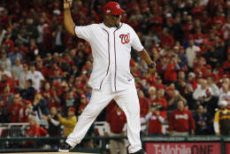 Former Washington Nationals pitcher Livan Hernandez throws out a ceremonial first pitch at Game 5 of baseball's National League Division Series between the Nationals and the Los Angeles Dodgers at Nationals Park, Thursday, Oct. 13, 2016, in Washington. (AP Photo/Pablo Martinez Monsivais)