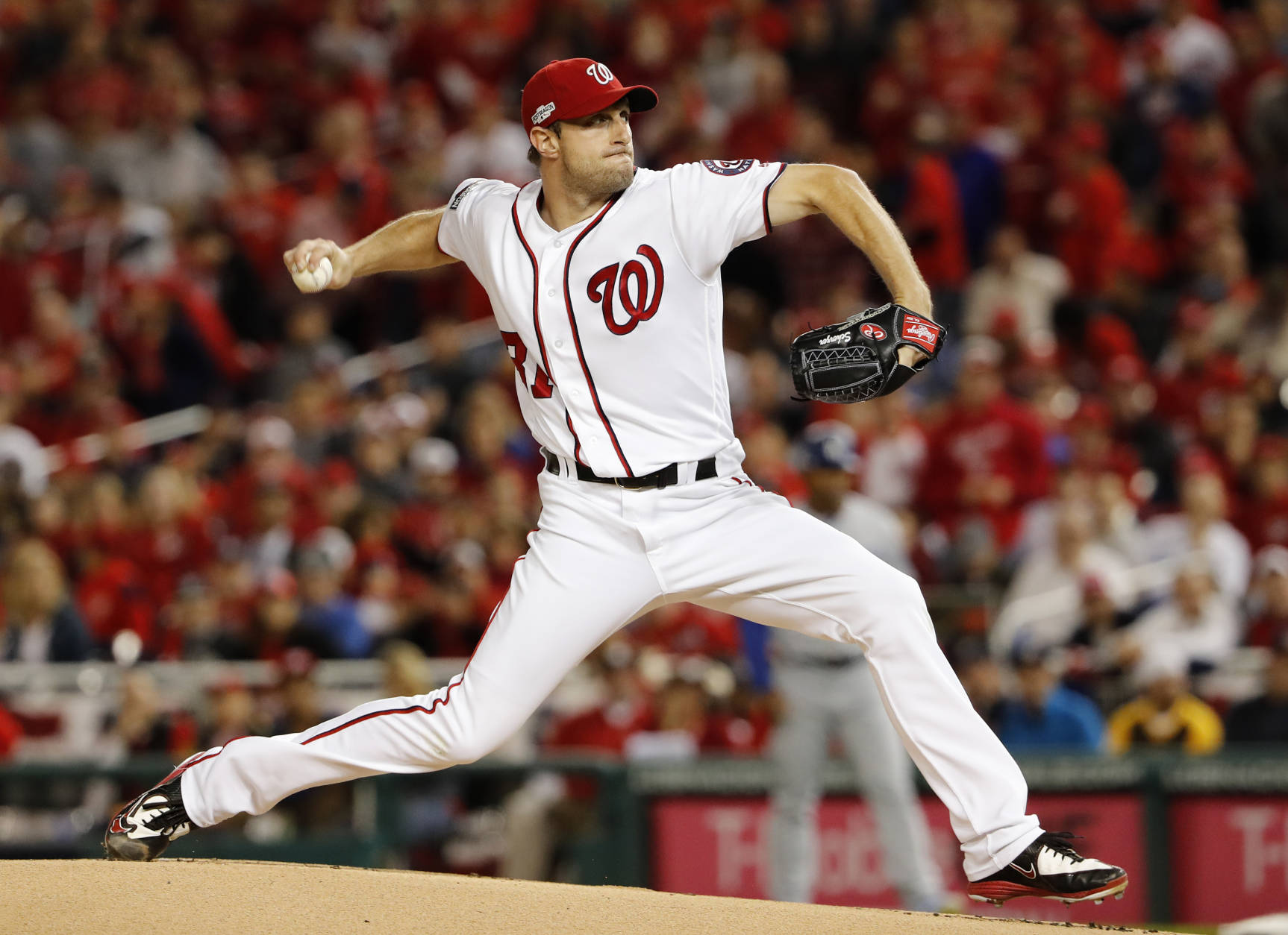Washington Nationals starting pitcher Max Scherzer throws during the first inning of Game 5 of baseball's National League Division Series, against the Los Angeles Dodgers at Nationals Park, Thursday, Oct. 13, 2016, in Washington. (AP Photo/Pablo Martinez Monsivais)