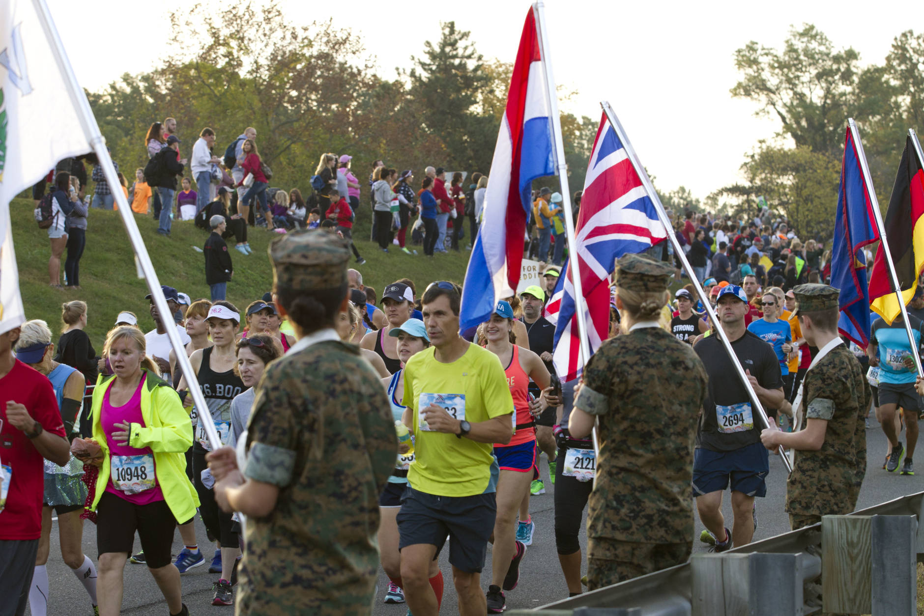 Runners compete in the 41st Marine Corps Marathon, Sunday, Oct. 30, 2016 in Arlington, Va. The race includes runners from 55 nations and each branch of the U.S. armed forces. ( AP Photo/Jose Luis Magana)