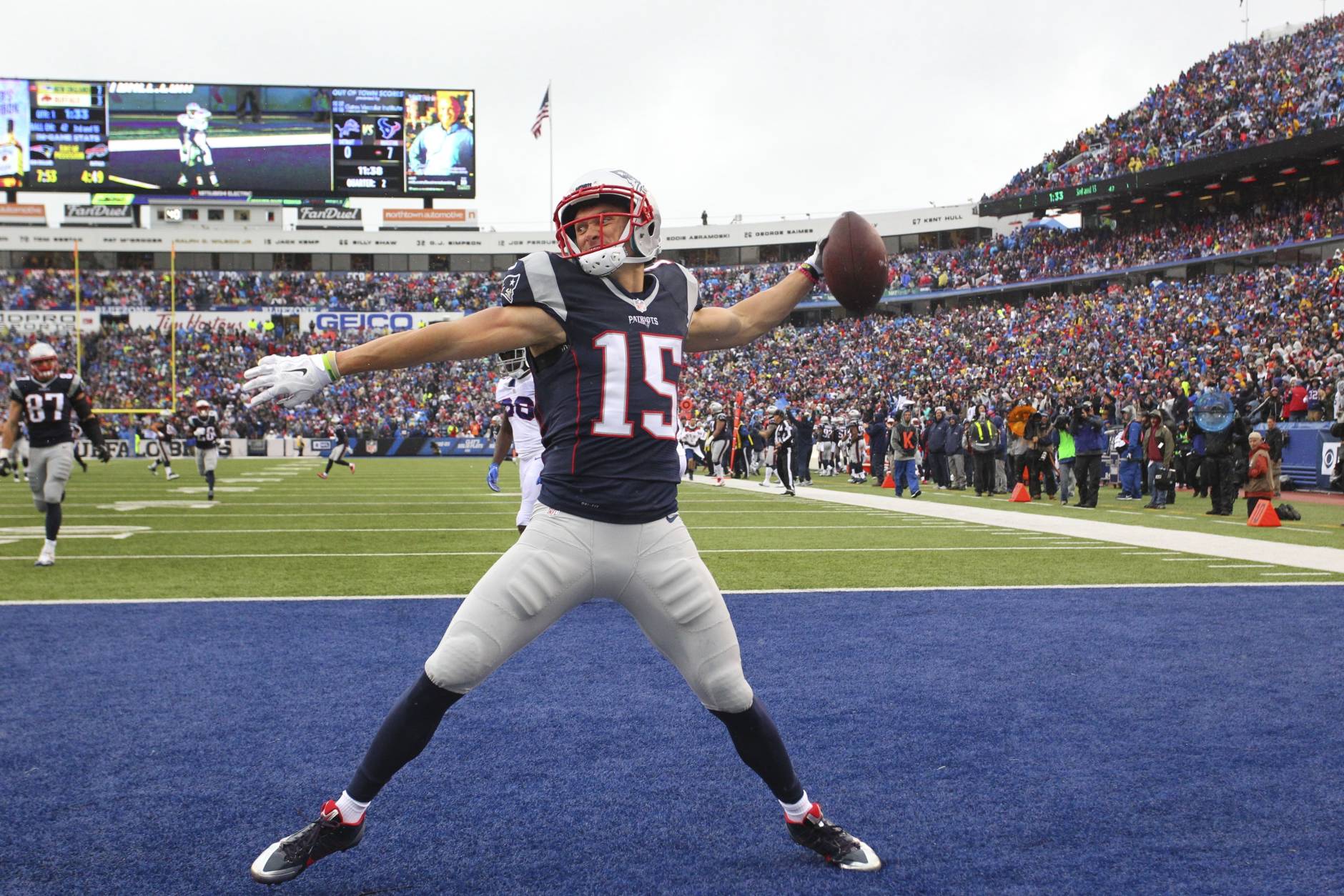 New England Patriots' Chris Hogan (15) celebrates after scoring a touchdown during the first half of an NFL football game against the Buffalo Bills Sunday, Oct. 30, 2016, in Orchard Park, N.Y. (AP Photo/Bill Wippert)