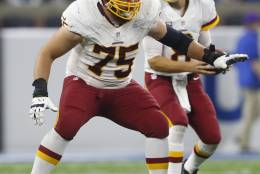 Washington Redskins offensive guard Brandon Scherff (75) protects quarterback Kirk Cousins during the second half of an NFL football game against the Detroit Lions, Sunday, Oct. 23, 2016 in Detroit. (AP Photo/Paul Sancya)