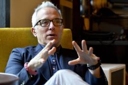 Chef Geoffrey Zakarian gestures as he speaks during an interview with The Associated Press, Friday, Feb. 20, 2015, in Miami Beach, Fla. Now honored with an Iron Chef title, a judging seat on "Chopped" and a best-selling cookbook, Zakarian says opening a restaurant is a lot like playing poker. "It's a crap shoot. We gamble when we open a restaurant," said Zakarian, whose restaurants include The Lambs Club and The National. (AP Photo/Wilfredo Lee)