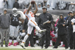 Kansas City Chiefs cornerback Marcus Peters (22) intercepts a pass against the Oakland Raiders during the first half of an NFL football game in Oakland, Calif., Sunday, Oct. 16, 2016. (AP Photo/Ben Margot)