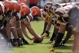 The Cleveland Browns and Washington Redskins man the line of scrimmage during the second half of an NFL football game Sunday, Oct. 2, 2016, in Landover, Md. (AP Photo/Mark Tenally)