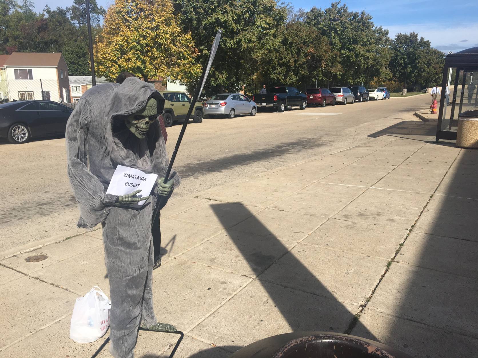 This animontronic "grim reaper" was brought to a rally held by Metro worker union members who, say plans to raise fares and cut service would send the system in to a death spiral. (WTOP/Max Smith)