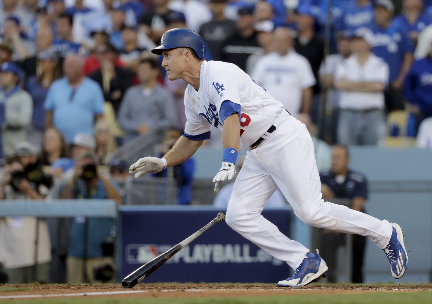 Los Angeles Dodgers' Chase Utley watches his RBI-single during the eighth inning in Game 4 of a baseball National League Division Series against the Washington Nationals in Los Angeles, Tuesday, Oct. 11, 2016. (AP Photo/Jae C. Hong)