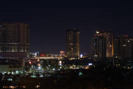 LAS VEGAS, NV - FEBRUARY 18:  Exterior lights on hotel-casinos on the Las Vegas Strip go dark for three minutes in memory of former UNLV head basketball coach Jerry Tarkanian after the team's game against the Boise State Broncos on February 18, 2015 in Las Vegas, Nevada. Tarkanian, who led the UNLV Rebels for 19 seasons, taking the team to four Final Fours and winning the 1990 national championship during his 31-year coaching career, died on February 11 at 84.  (Photo by Ethan Miller/Getty Images)
