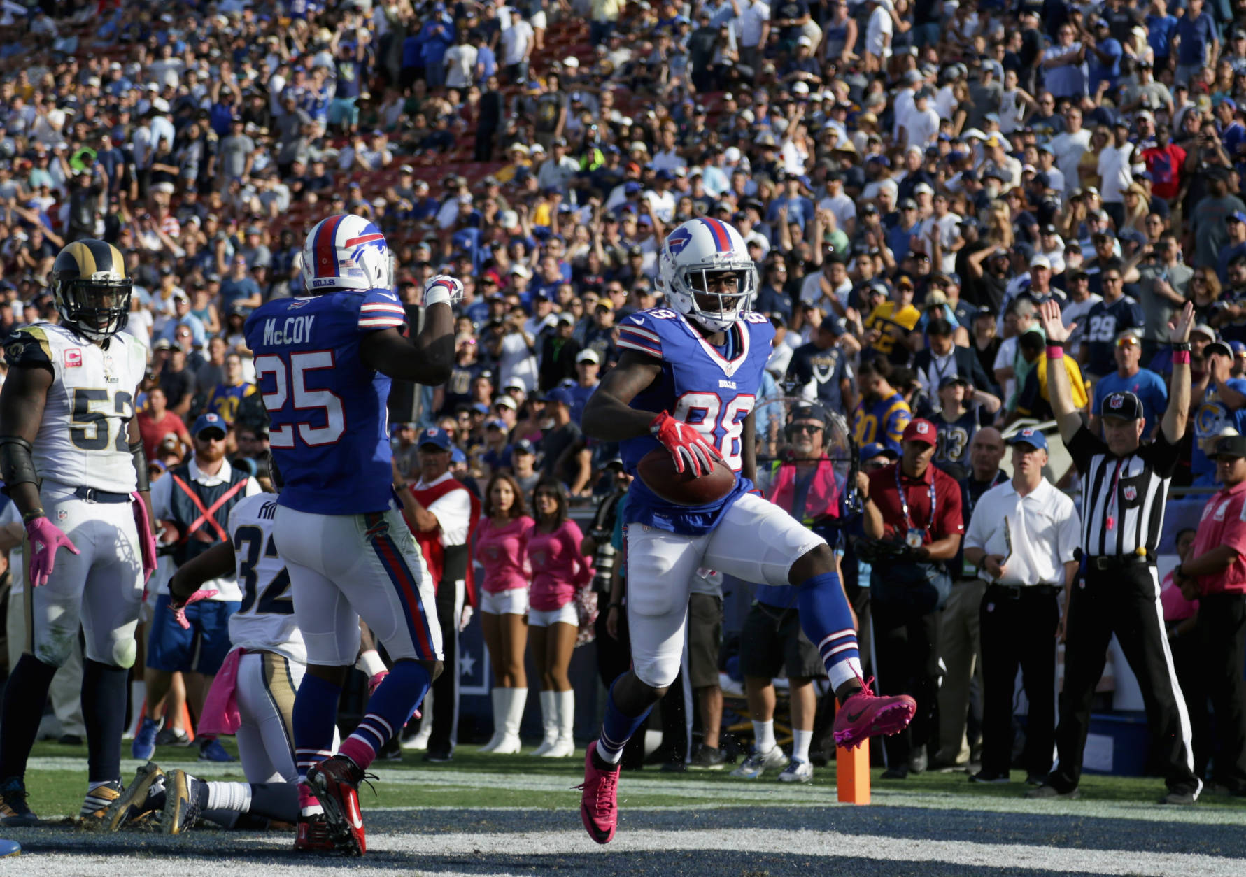 LOS ANGELES, CA - OCTOBER 09:  Marquise Goodwin #88 of the Buffalo Bills celebrates his touchdown with teammates to take a 30-19 lead in the fourth quarter of the game against the Los Angeles Rams at the Los Angeles Memorial Coliseum on October 9, 2016 in Los Angeles, California.  (Photo by Jeff Gross/Getty Images)