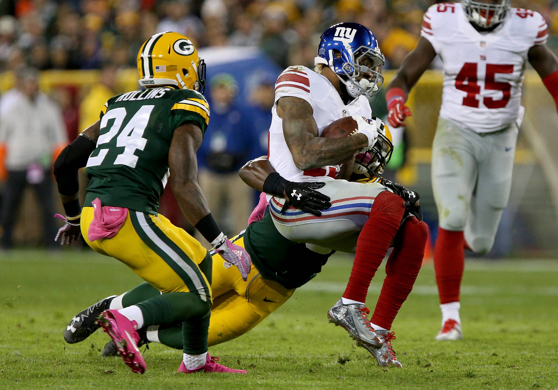 GREEN BAY, WI - OCTOBER 09:   Odell Beckham #13 of the New York Giants is tackled by Joe Thomas #48 of the Green Bay Packers in the second quarter at Lambeau Field on October 9, 2016 in Green Bay, Wisconsin. (Photo by Dylan Buell/Getty Images)