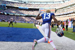 EAST RUTHERFORD, NJ - OCTOBER 16:  Odell Beckham #13 of the New York Giants removes his helmet and draws a penalty after scoring the go ahead touchdown against the Baltimore Ravens in the fourth quarter with the Giants winning 27-23 during their game at MetLife Stadium on October 16, 2016 in East Rutherford, New Jersey.  (Photo by Al Bello/Getty Images)