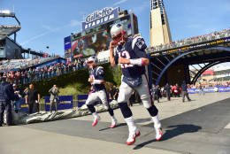 FOXBORO, MA - OCTOBER 16:  Tom Brady #12 of the New England Patriots takes the field before a game against the Cincinnati Bengals at Gillette Stadium on October 16, 2016 in Foxboro, Massachusetts.  (Photo by Billie Weiss/Getty Images)