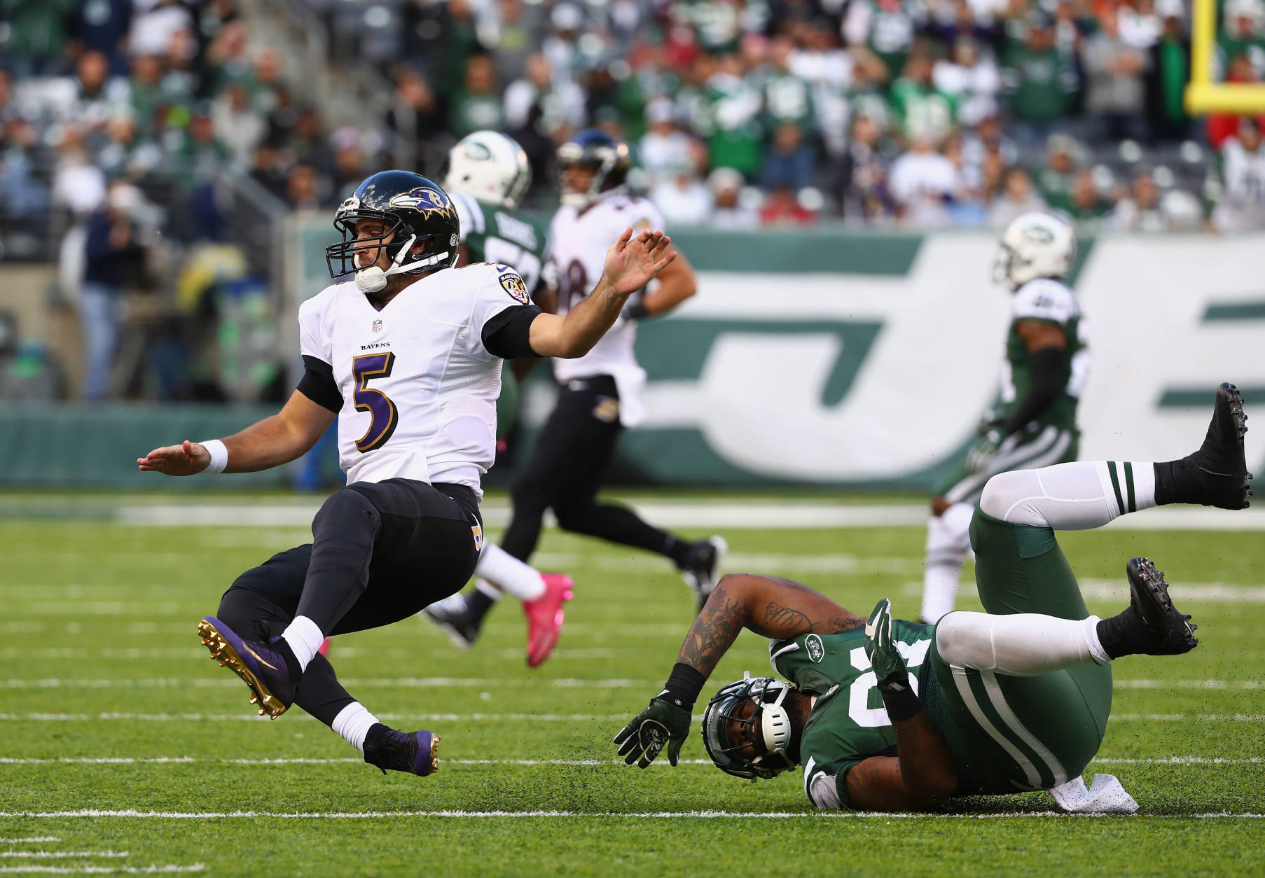 EAST RUTHERFORD, NJ - OCTOBER 23: Quarterback Joe Flacco #5 of the Baltimore Ravens is tackled by Sheldon Richardson #91 of the New York Jets in teh fourth quarter at MetLife Stadium on October 23, 2016 in East Rutherford, New Jersey. The New York Jets won 24-16. (Photo by Al Bello/Getty Images)