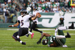 EAST RUTHERFORD, NJ - OCTOBER 23: Quarterback Joe Flacco #5 of the Baltimore Ravens is tackled by Sheldon Richardson #91 of the New York Jets in teh fourth quarter at MetLife Stadium on October 23, 2016 in East Rutherford, New Jersey. The New York Jets won 24-16. (Photo by Al Bello/Getty Images)