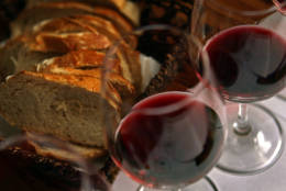 TEL AVIV, ISRAEL - MARCH 25:  Fresh country bread and red wine are served with lunch at the Carmella Banahela bistro on March 25, 2008 in Tel Aviv, Israel. World food prices are soaring in the face of what some analysts are describing as a perfect storm of circumstances; increasing demand from developing economies in Asia, rising fuel prices, severe weather impacting recent harvests and an economic shift to biofuel production. All this leaves the consumer paying more for basic staples such as bread and milk and is likely to have its hardest impact on poorer nations.  (Photo by David Silverman/Getty Images)