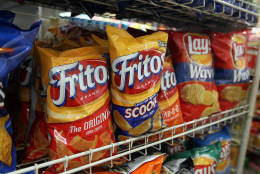 MIAMI -MARCH 22: Bags of chips manufactured by PepsiCo Frito-Lay brand are seen on a shelf on March 22, 2010 in Miami, Florida.  PepsiCo announced plans to cut sugar, fat, and sodium in its products to address health and nutrition concerns. The maker of soft drinks including Pepsi-Cola, Gatorade also makes Frito-Lay brand snacks.  (Photo by Joe Raedle/Getty Images)