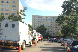 A multistory apartment building was evacuated Sunday afternoon in Alexandria. (WTOP/Dick Uliano)