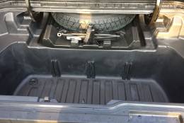 Simply open the door on the floor of the 2017 Honda Ridgeline 2017 and there’s water tight storage and a drain plug so it can be used as a cooler at tailgates.  (WTOP/Mike Parris)