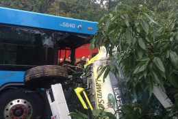 Emergency responders at the scene of a crash involving a Ride On bus and a truck  in Gaithersburg, Md., on Oct. 1, 2016.  (Pete Piringer/MCFRS)