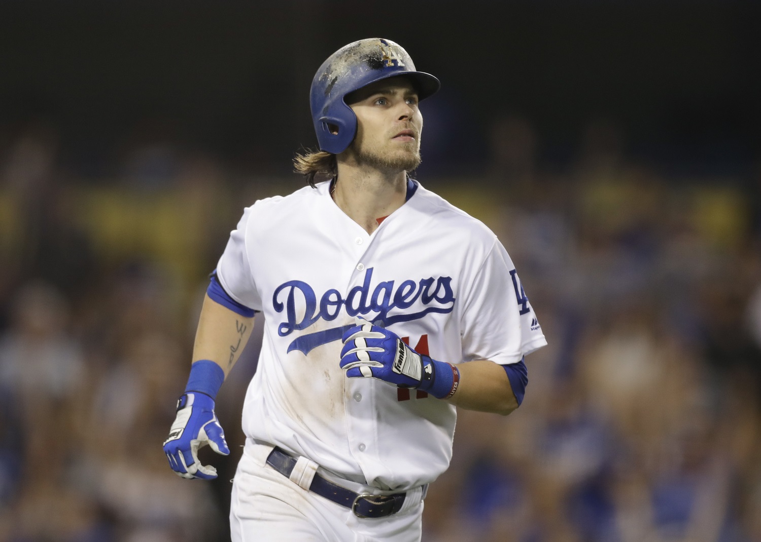 Los Angeles Dodgers' Josh Reddick watches the flight of his grand slam during the seventh inning of a baseball game against the Colorado Rockies, Saturday, Sept. 24, 2016, in Los Angeles. (AP Photo/Jae C. Hong)