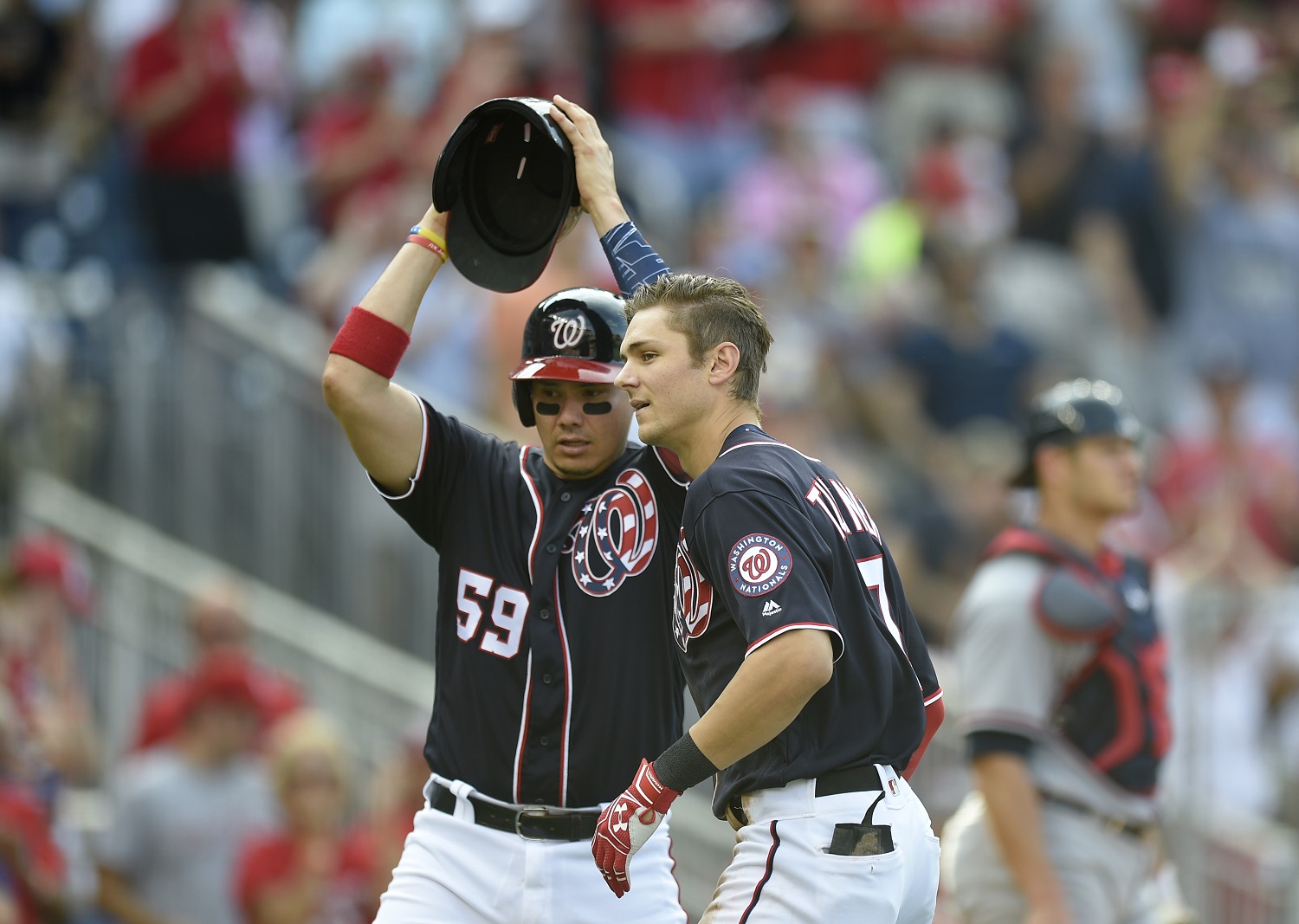 Washington Nationals' Trea Turner, right, celebrates his two-run home run with Jose Lobaton (59) during the third inning of a baseball game against the Atlanta Braves, Monday, Sept. 5, 2016, in Washington. (AP Photo/Nick Wass)