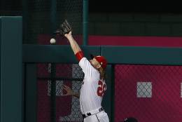 Washington Nationals left fielder Jayson Werth misses a two-run homer by Los Angeles Dodgers' Justin Turner during the third inning of Game 1 of a baseball National League Division Series at Nationals Park, Friday, Oct. 7, 2016, in Washington. (AP Photo/Pablo Martinez Monsivais)
