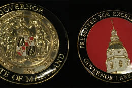 This is the other coin, shown in the photo with both sides, given to the flood heroes from Maryland Gov. Larry Hogan. (WTOP/Michelle Basch)
