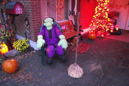 From Sue Rushkowski at her mom's house in Stratford Landing in Alexandria: "Frankenstein, a motion-activated dancing broom (freaks kids out), and a pumpkin tree. They have a fog machine over in the corner. We also have a witch on a swing in the tree. We have a string attached to the swing. When kids come up the long driveway (lined with bags w/candles in them) we start swinging the witch. Scares them pretty good…We have FUN!!!! (Sue Rushkowski)
