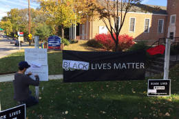 The "Black Lives Matter" sign was vandalized outside Christ Congregational Church in Silver Spring, Maryland. Residents repaired the sign and added messages. (WTOP/John Aaron)