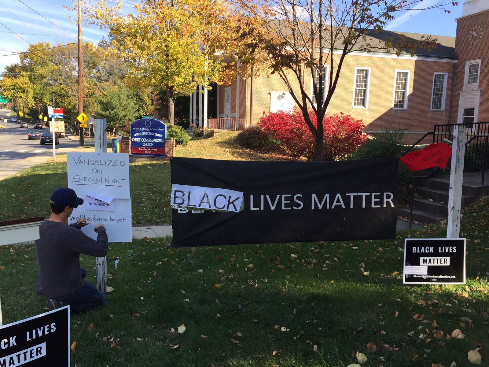 The "Black Lives Matter" sign was vandalized outside Christ Congregational Church in Silver Spring, Maryland. Residents repaired the sign and added messages. (WTOP/John Aaron)